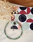 Torn, in Emerald - May Birthstone